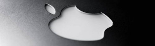 apple logo on a black macbook